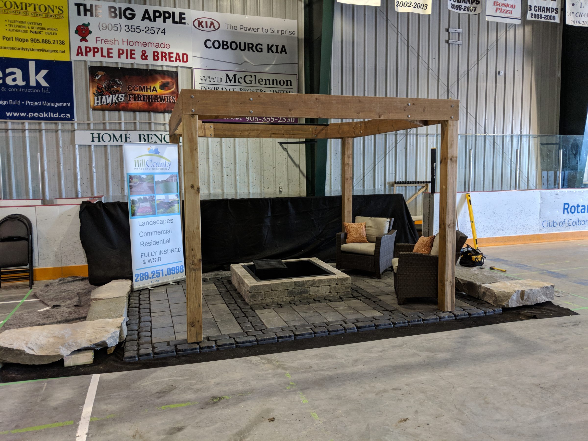 Outdoor patio display inside a hockey arena.