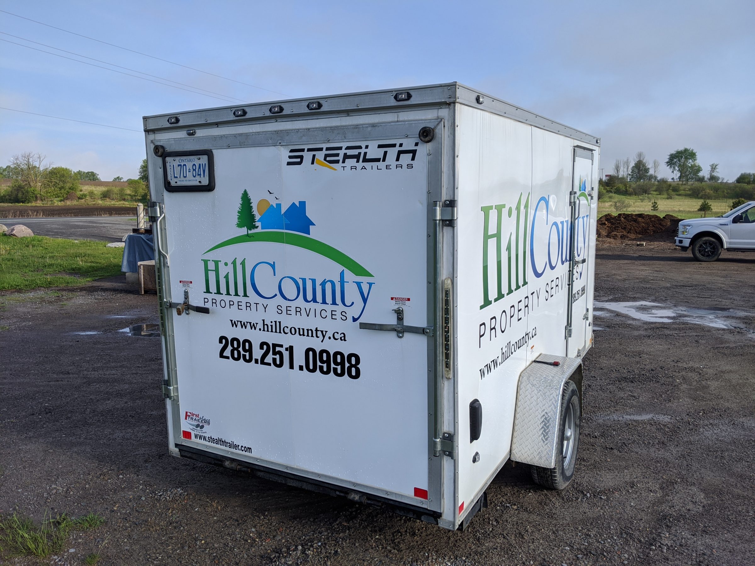 Hill County Property Services trailer in rural area