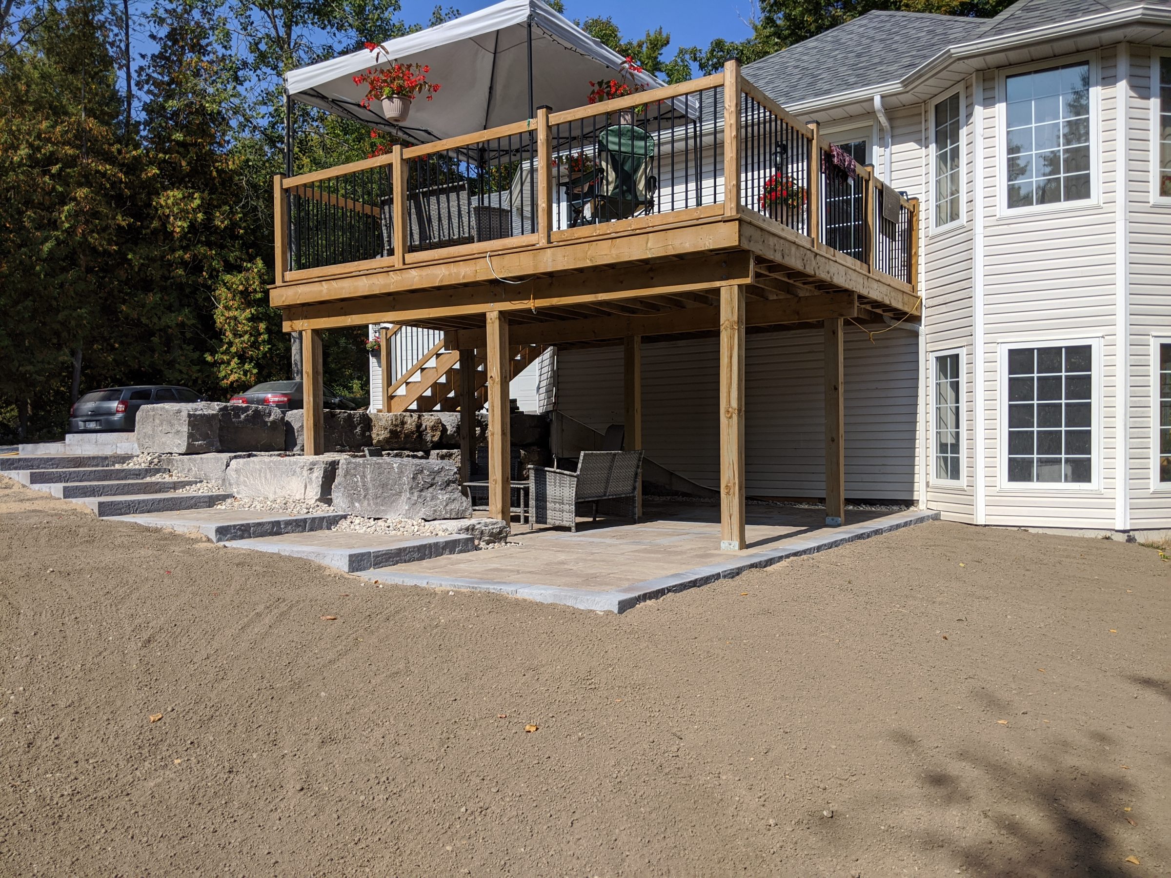 House with deck and patio under construction