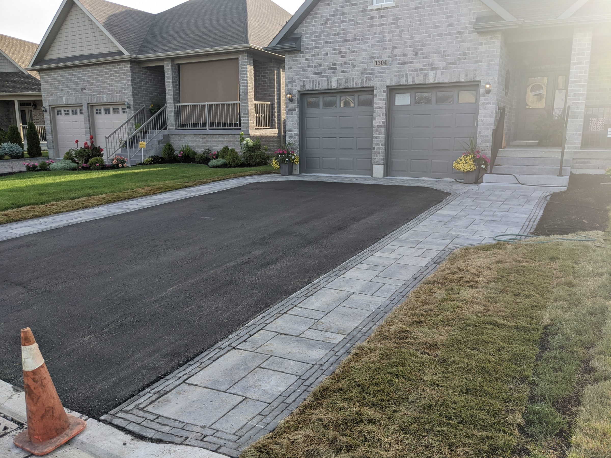 Brick house with two-car garage and driveway