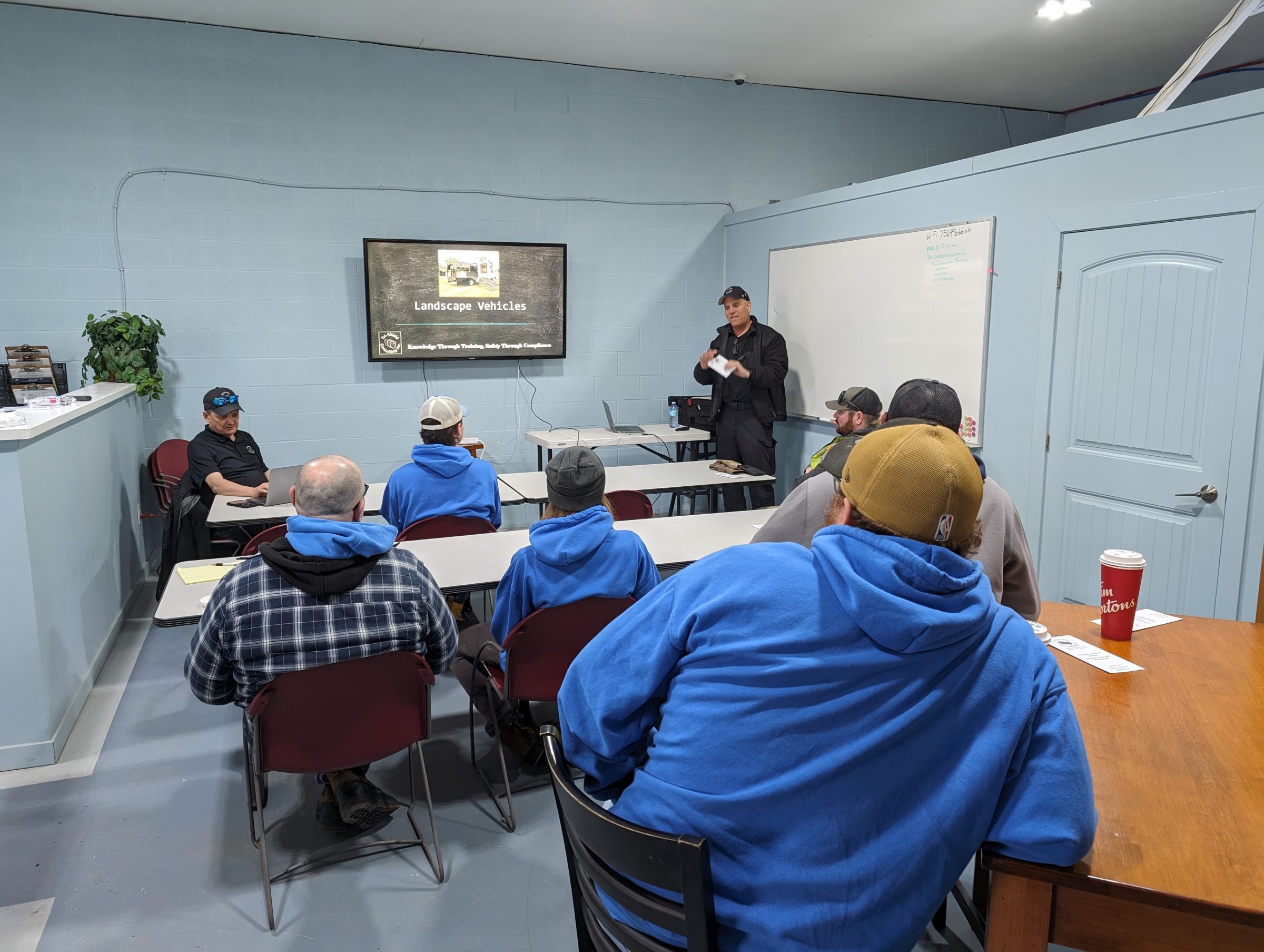 Classroom instruction on landscape vehicles training.
