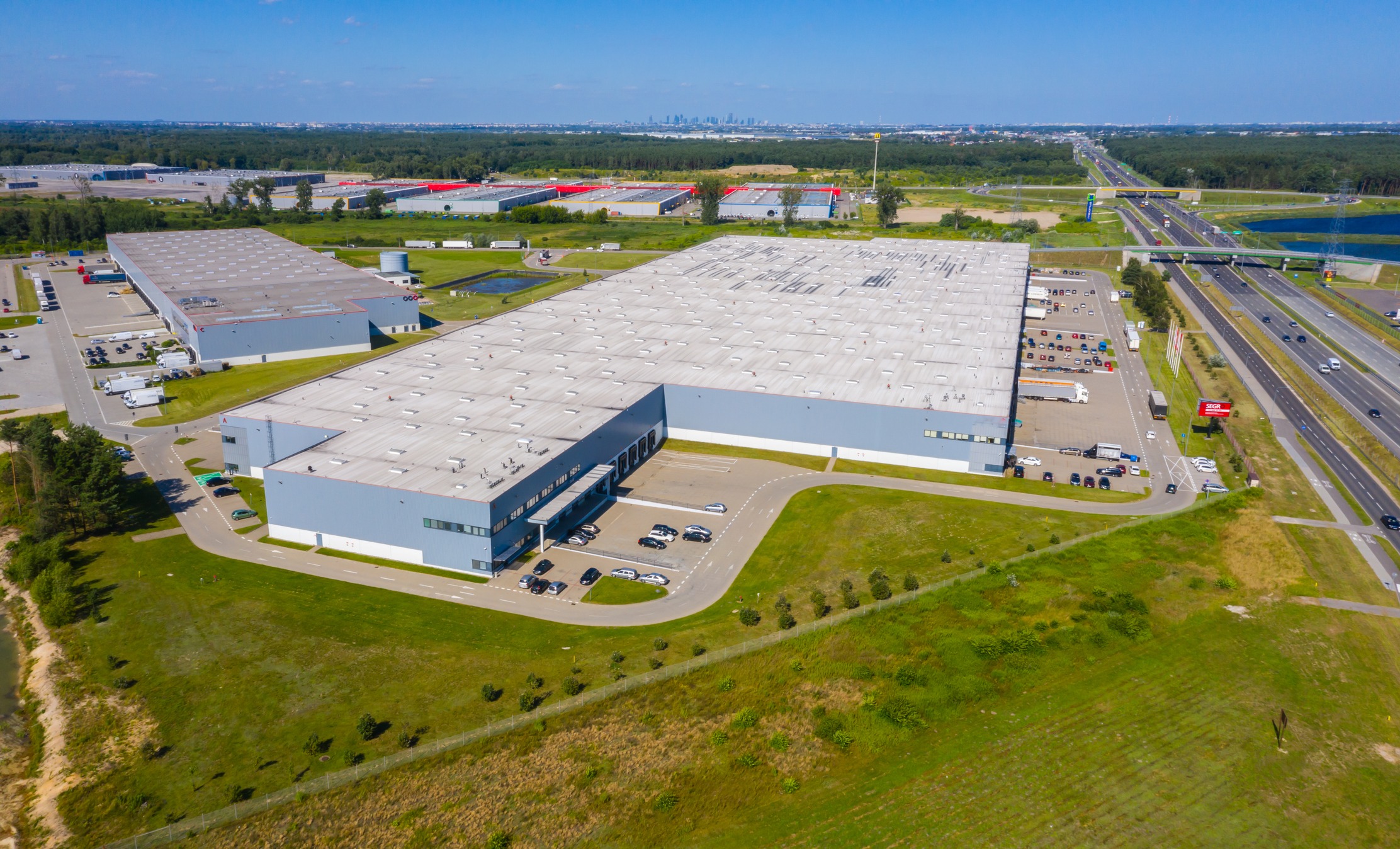 Aerial view of large industrial warehouse complex.
